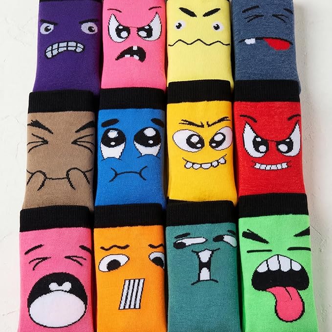 Set of colorful socks with cartoon face designs on a white background