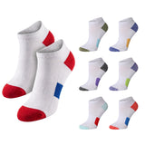 White low-cut athletic socks shown in multiple color options, with red toes and heels, blue side panels, and multicolor accents on the heels and toes.