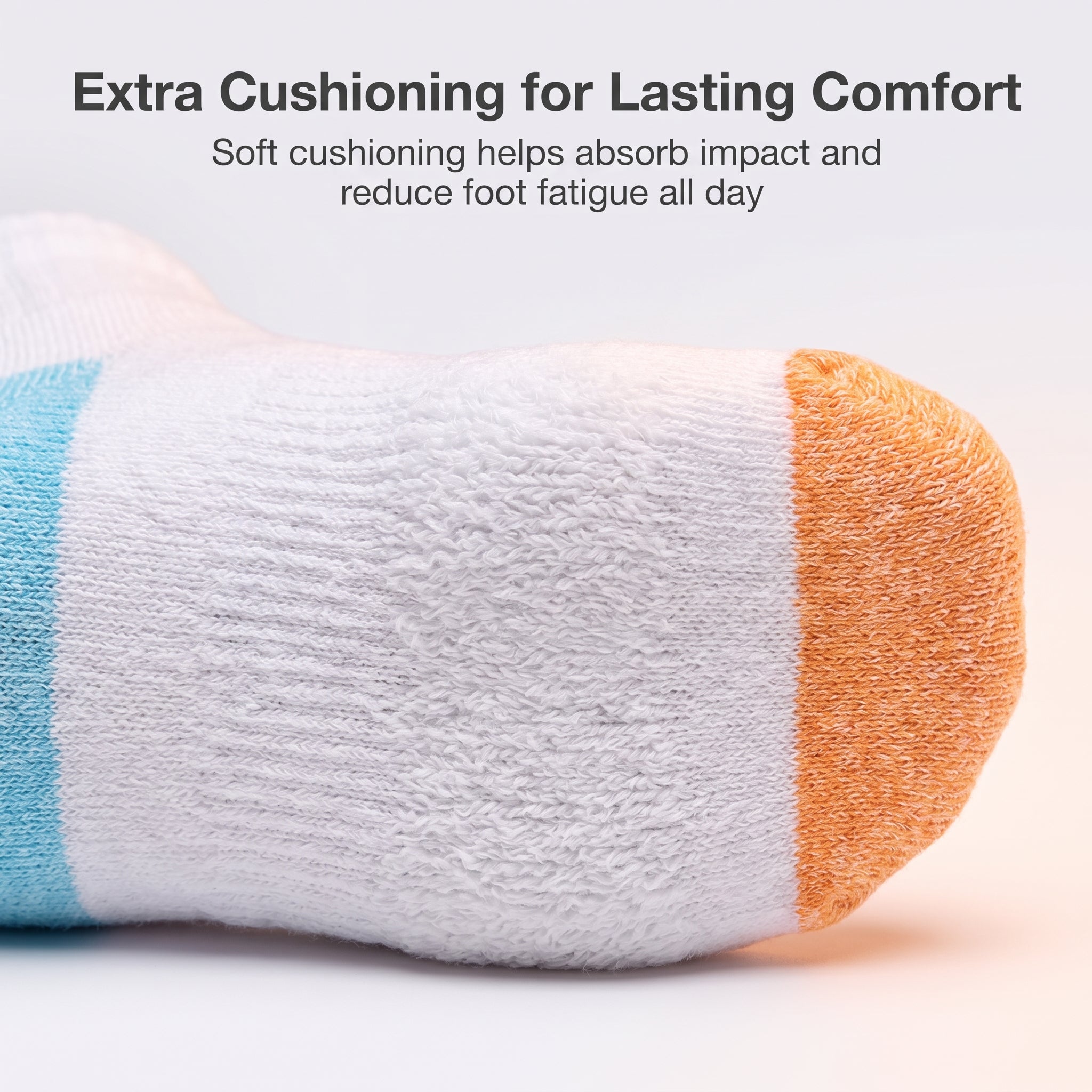 A close-up of a white sock with a light blue side stripe and an orange toe cap, shown against a clean white background with promotional text at the top.