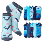 A set of low-cut ankle socks shown on a plain white background, including one pair with a light blue whale print and several additional color and pattern options such as dark blue whales, black-and-white striped fish, anchors, and fish motifs.