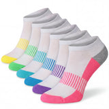 Set of six pairs of socks with colorful accents on a white background
